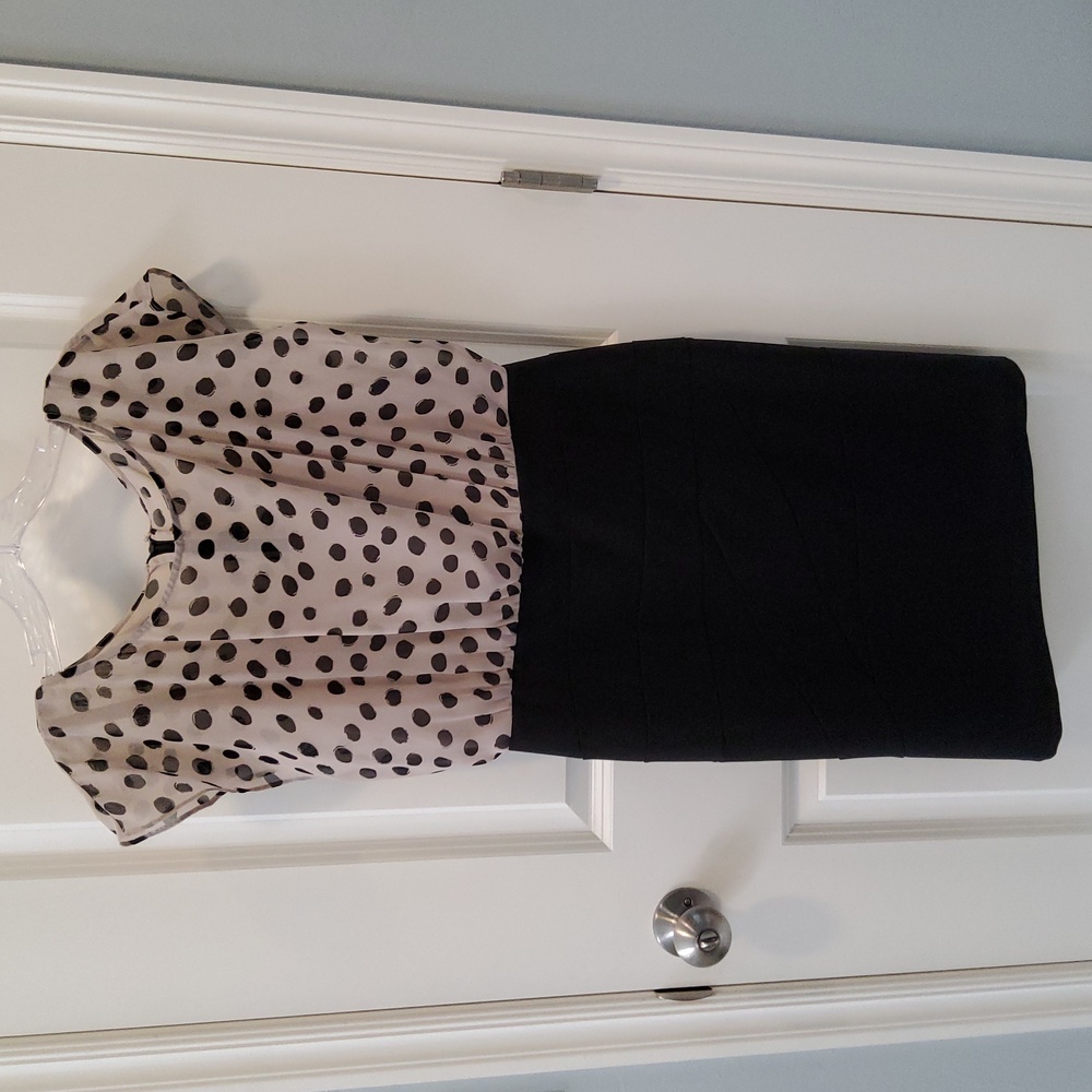 Black and taupe business casual dress.